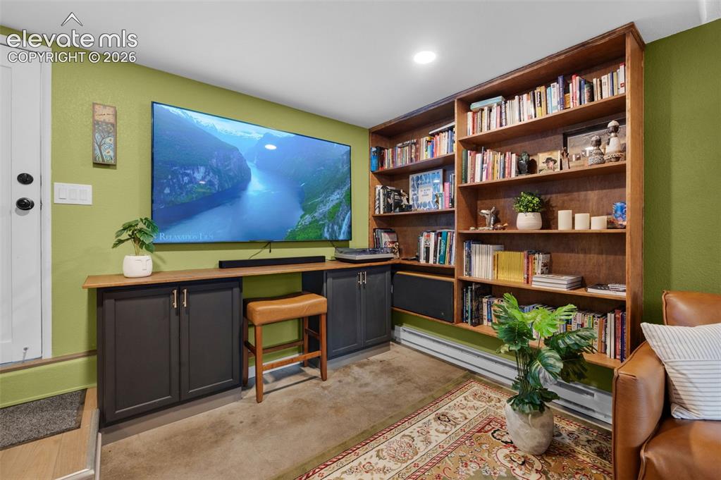 Image 39 of 50: Builtin cabinets and bookshelves