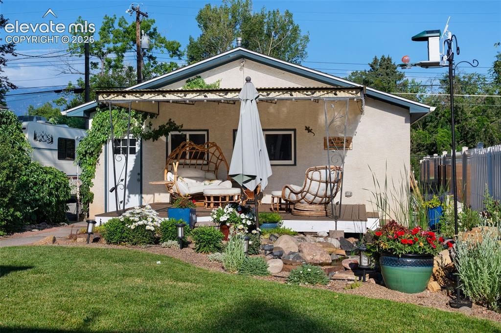 Image 43 of 50: 2nd covered deck, overlooking the pond
