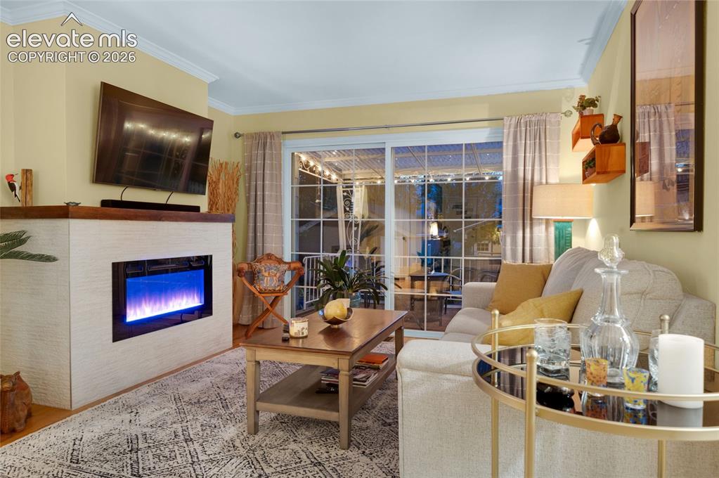 Image 8 of 50: 8ft sliding door for views and indoor/outdoor entertaining 