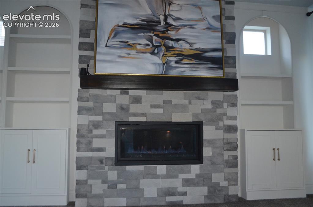 Image 16 of 30: Fireplace