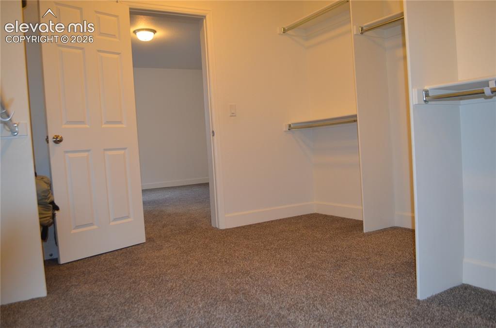 Image 18 of 30: Closet attached to bedroom in basement
