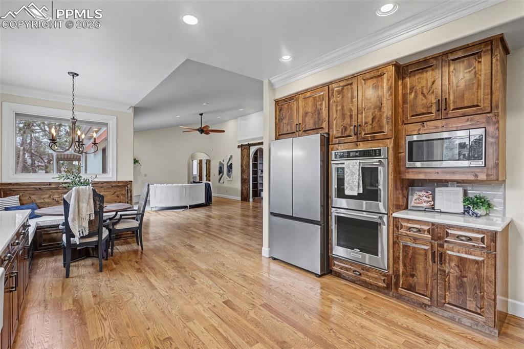 Image 10 of 49: Built in bench style seating for informal dining