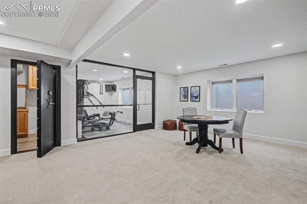 Image 28 of 49: Custom built walk in safe and gym