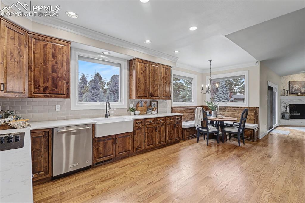 Image 8 of 49: Built in bench style seating for informal dining