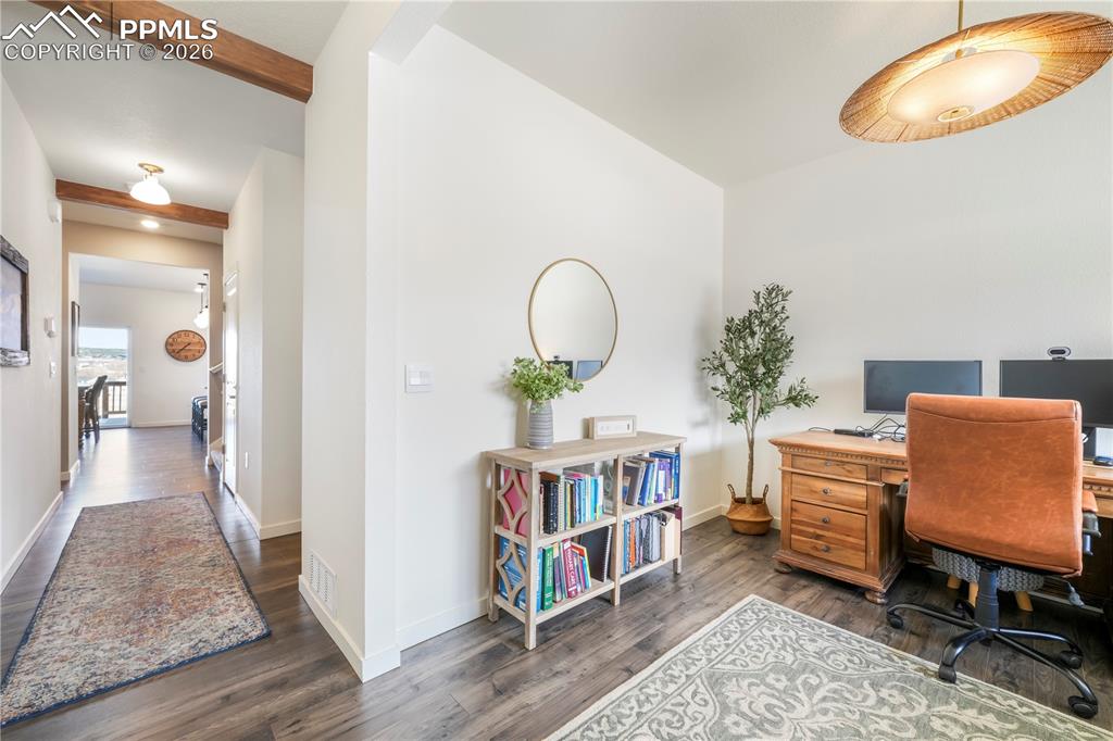 Image 7 of 50: Main level office, views of entry and hallway