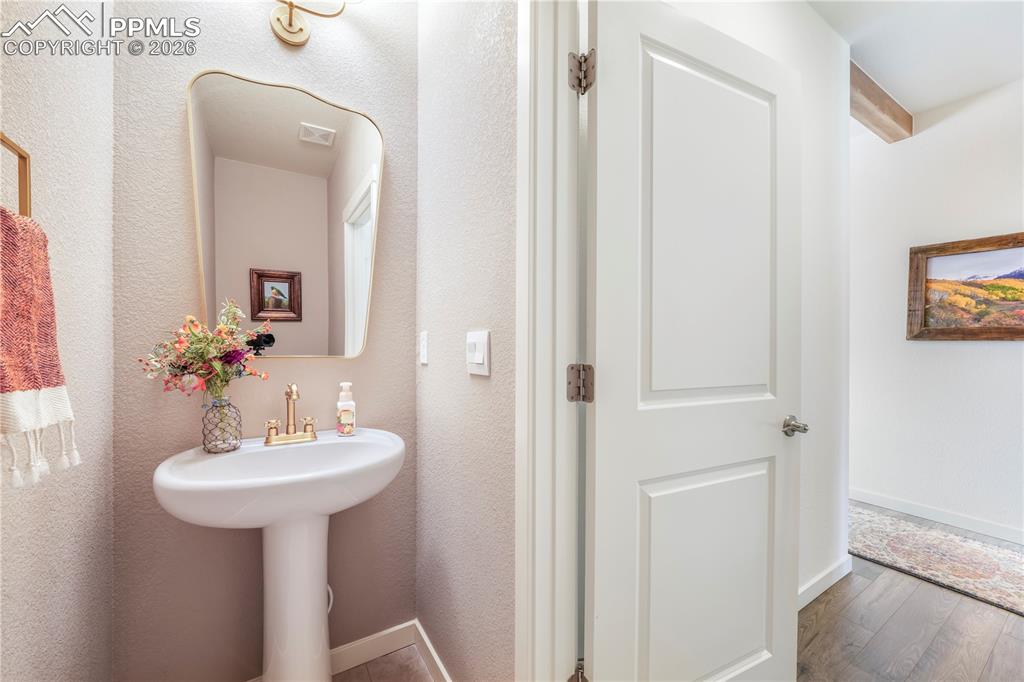 Image 8 of 50: Main level 1/2 bathroom