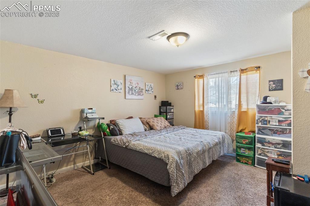 Image 15 of 21: Bedroom