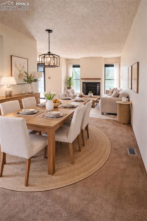 Image 6 of 17: Living room and Dining room Virtually Staged