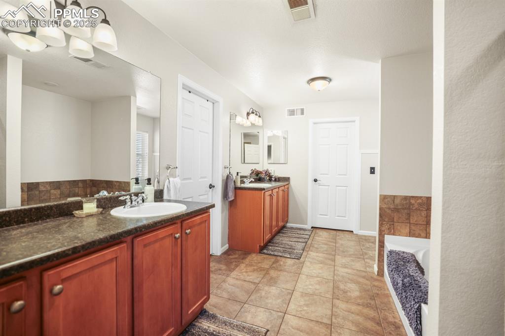 Image 23 of 49: Master Bathroom