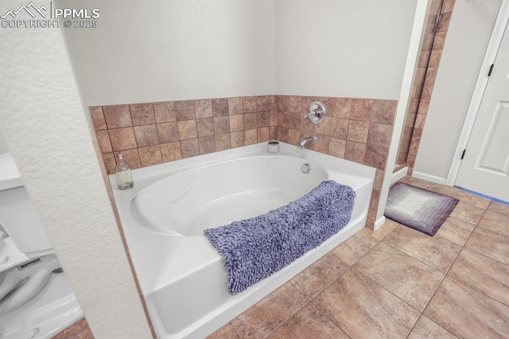 Image 25 of 49: Master Bathroom