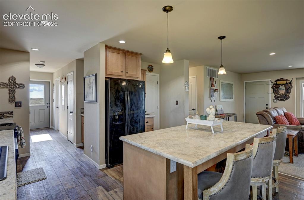 Image 19 of 50: island and hallway