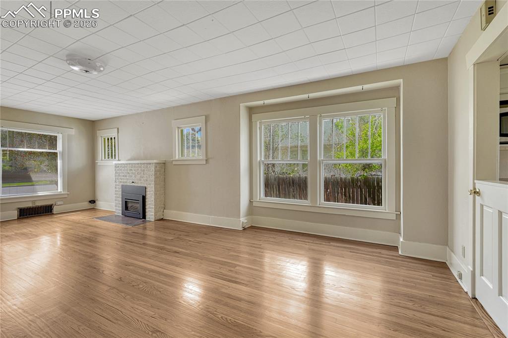 Image 12 of 38: Dining Room/Living Room