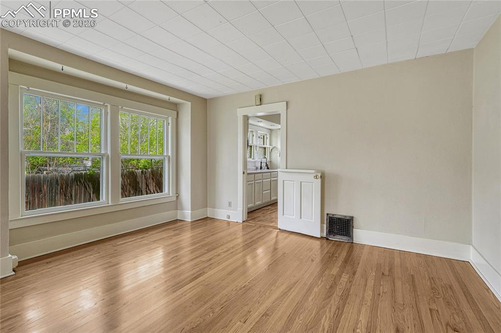 Image 13 of 38: Dining Room/Living Room