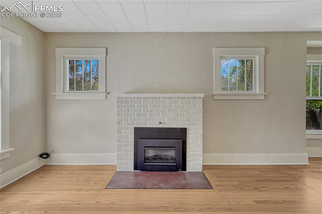 Image 8 of 38: Living Room with fireplace