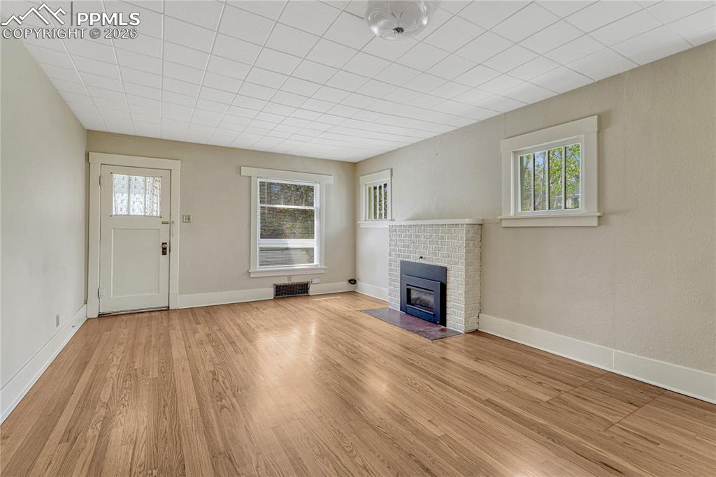 Image 9 of 38: Living Room with fireplace