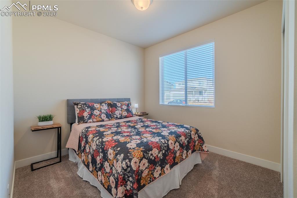 Image 7 of 49: Bedroom