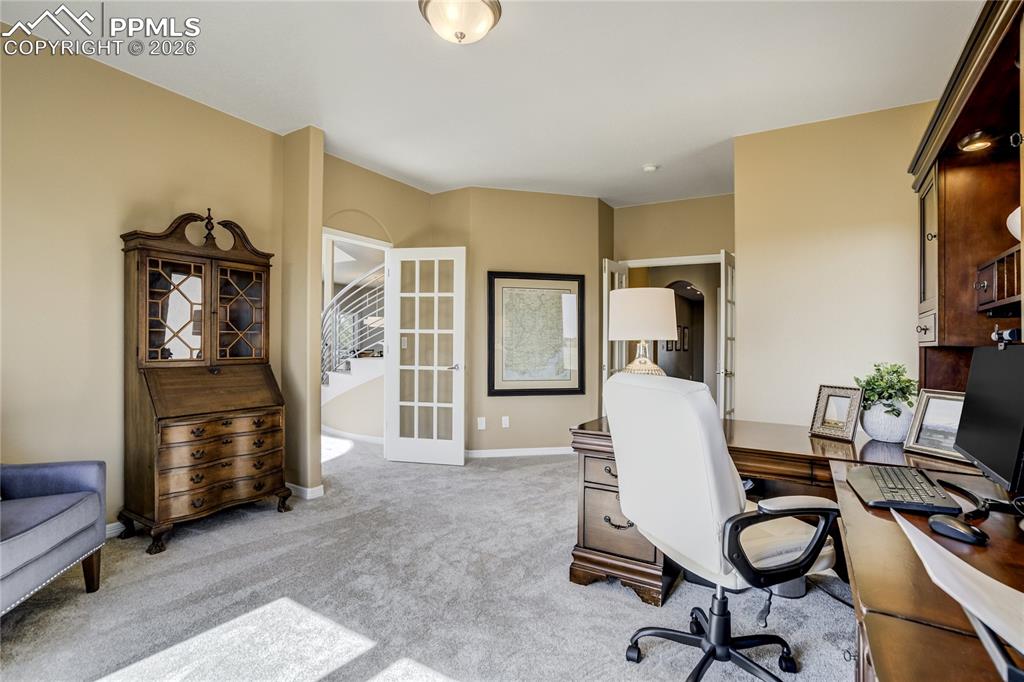 Image 25 of 50: A dedicated office provides a private and functional workspace, positioned 