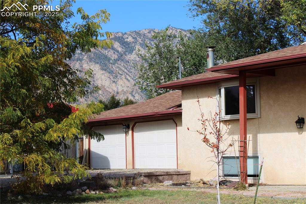 Image 2 of 48: View of side of home