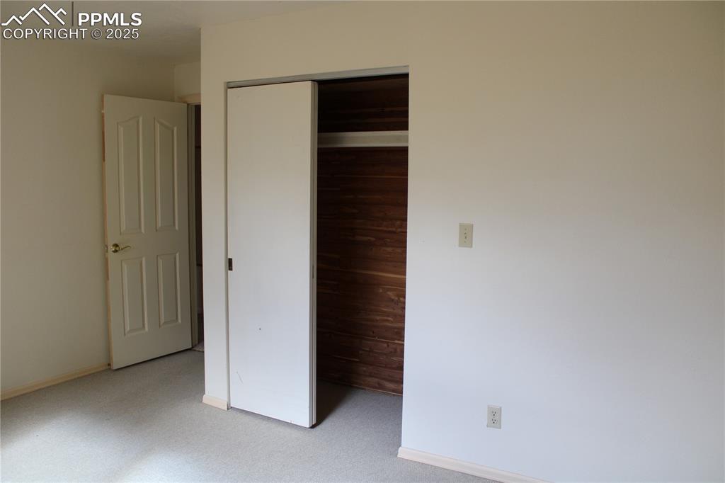 Image 34 of 48: Both lower bedrooms have cedar lined closets.
