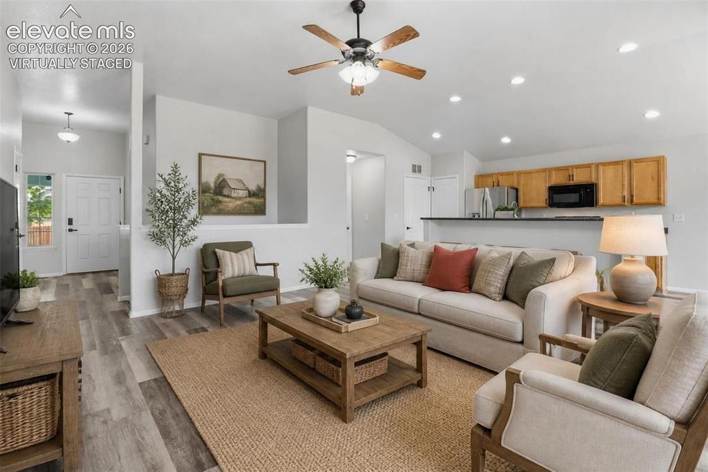 Image 8 of 50: Virtually Staged- Main Level Living Room