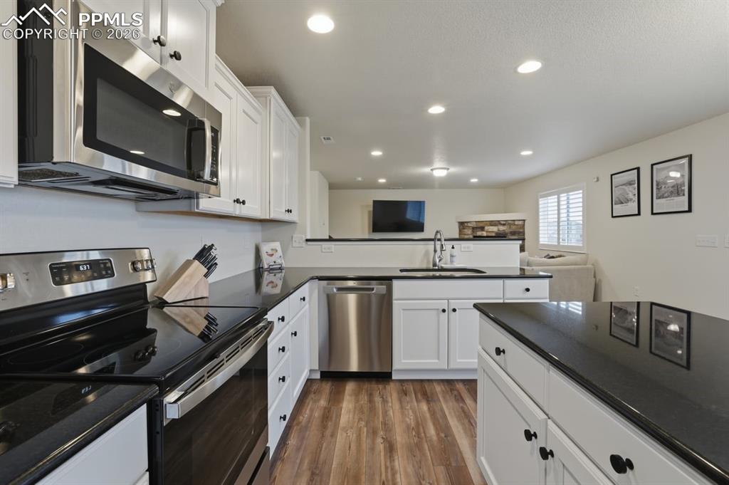 Image 15 of 38: this open concept is perfect for entertaining