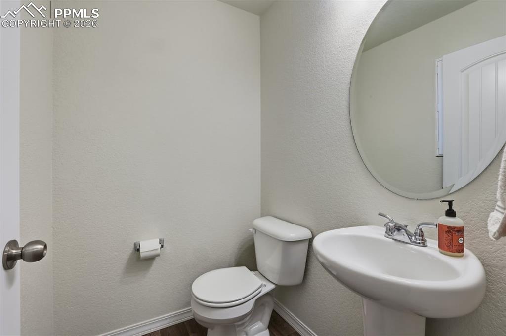 Image 18 of 38: main level powder bath