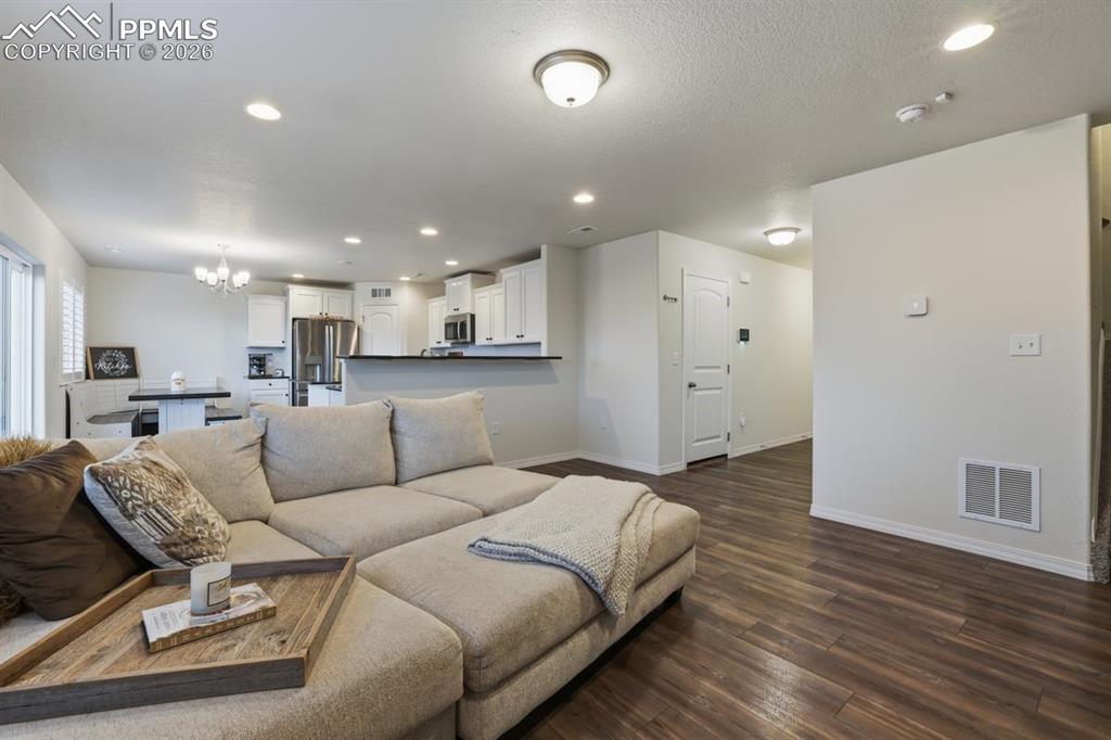 Image 8 of 38: spacious living room area