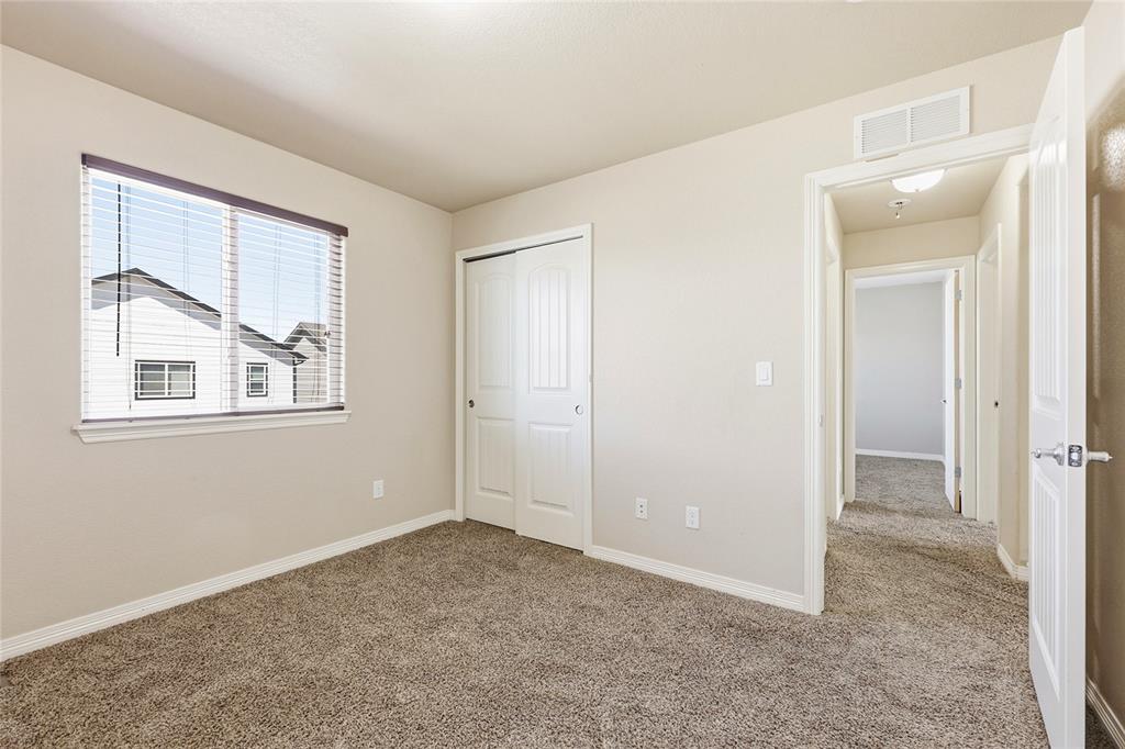 Image 13 of 21: Bedroom