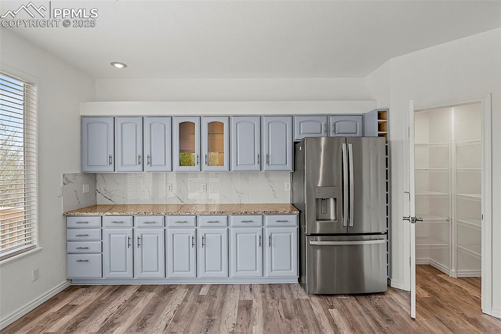 Image 20 of 48: Kitchen featuring stainless steel fridge, healthy amount of natural light, 