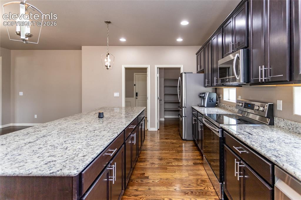 Image 16 of 45: Gourmet Kitchen with plumbed counter top coffee maker