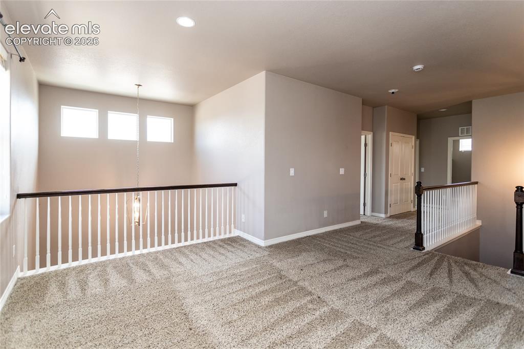 Image 23 of 45: Loft overlooks the Entry Foyer