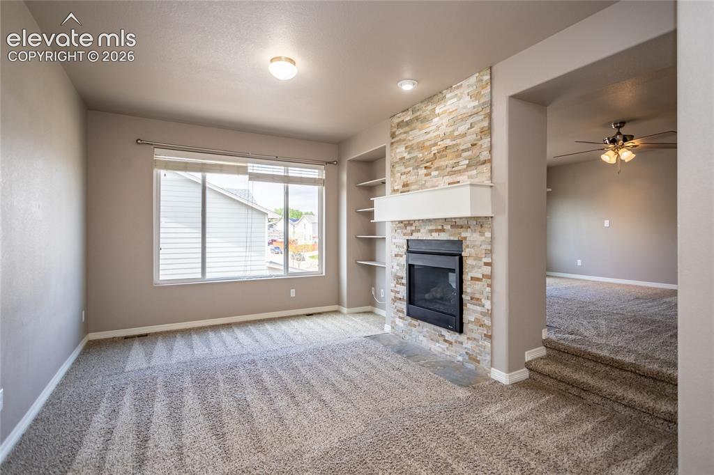 Image 24 of 45: Primary Retreat with double-sided fireplace that is attached to the Primary