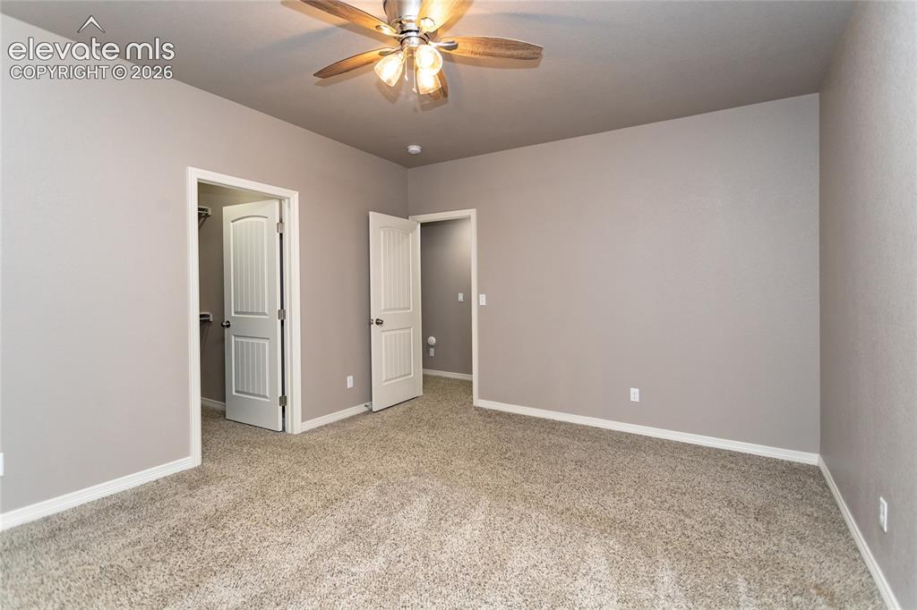 Image 35 of 45: Fourth Bedroom with walk-in closet