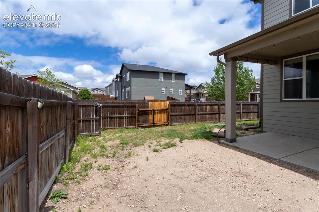 Image 45 of 45: Backyard has a side gate that opens off N Sioux Circle for any needed stora