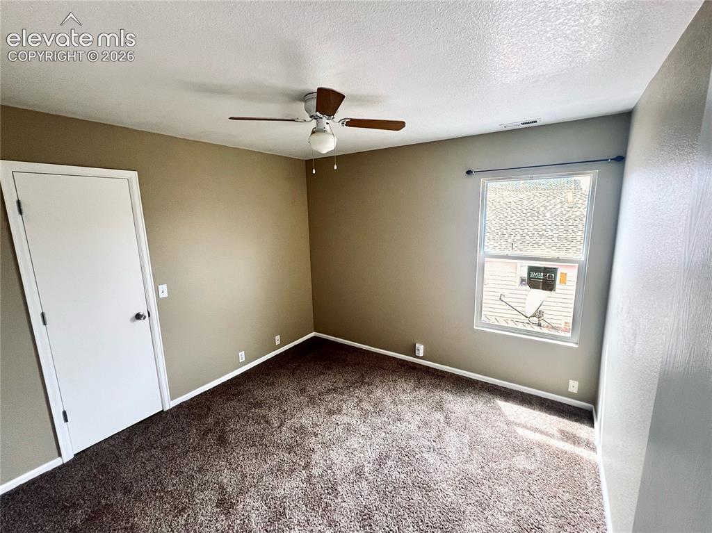 Image 15 of 29: Upper level hallway, new carpets + flooring throughout the upper level, too