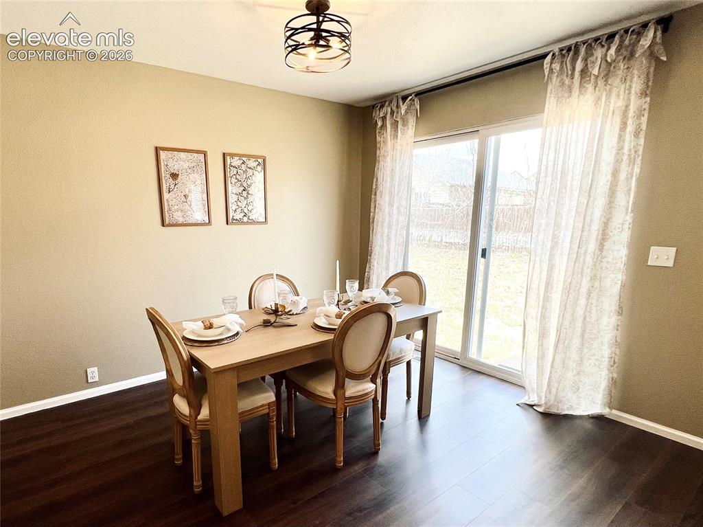 Image 9 of 29: Open Concept Living Room + Dining Area!