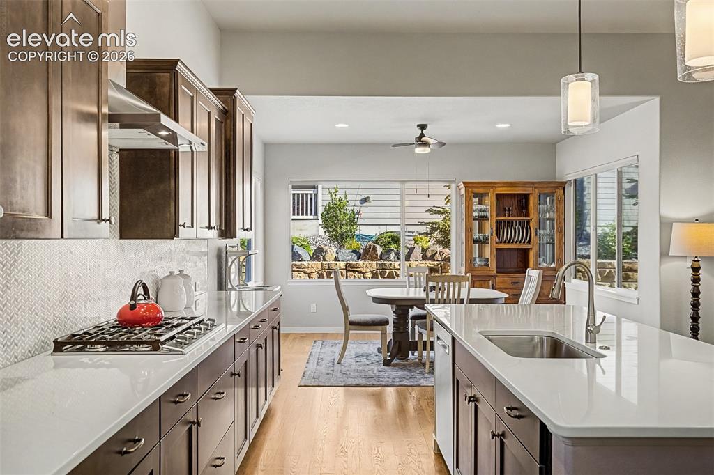 Image 23 of 46: Designed for gathering and entertaining, this beautifully appointed kitchen