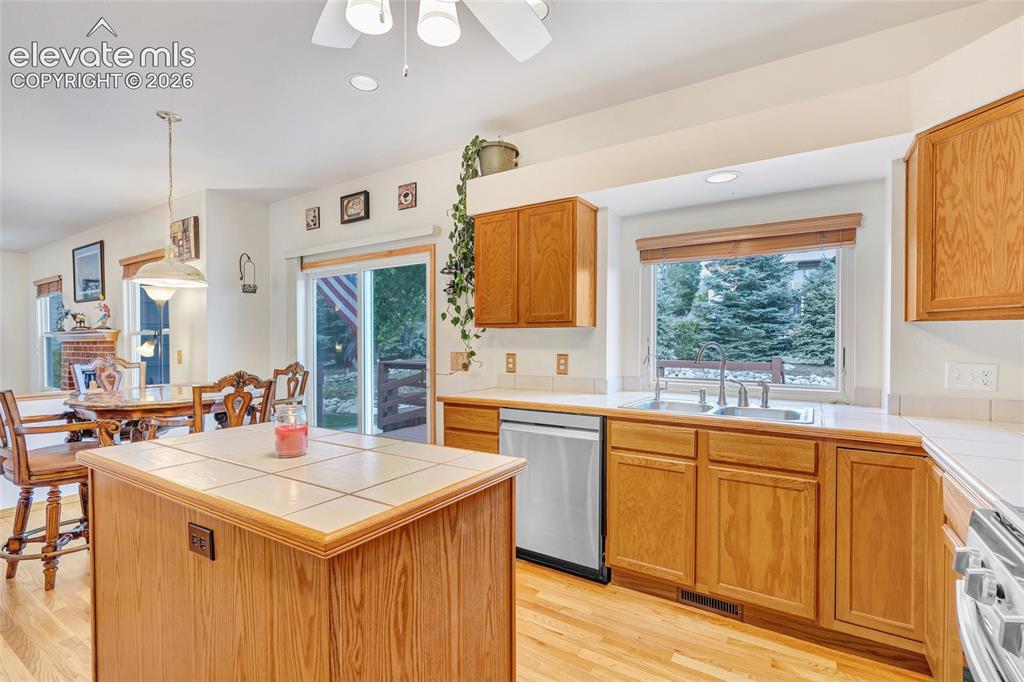 Image 12 of 47: The kitchen is the perfect size for entertaining or just making the day to 