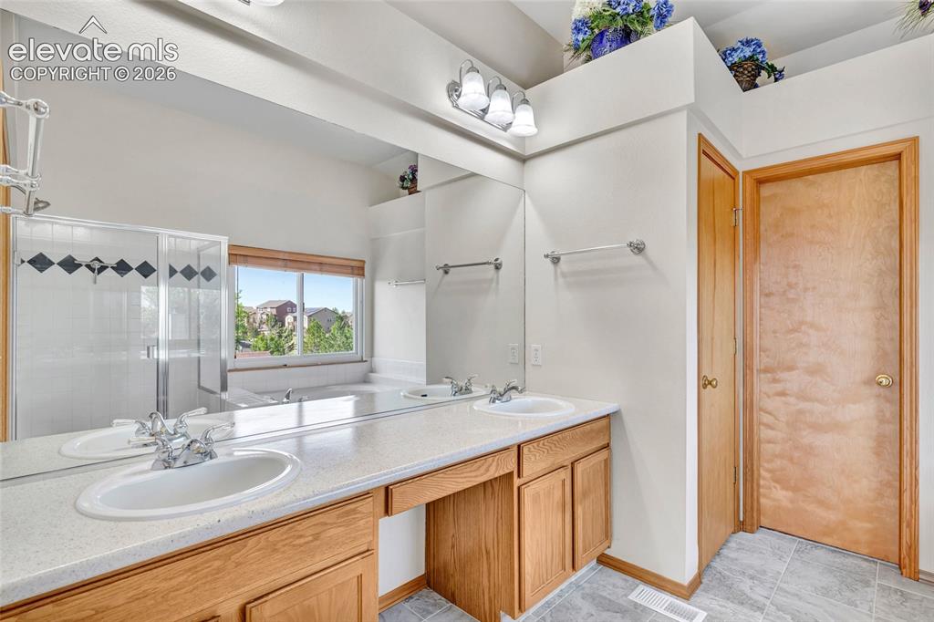 Image 18 of 47: Bright and clean the bathroom has everything you need.