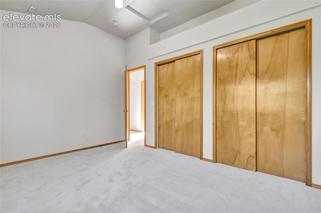 Image 25 of 47: Another view of the second bedroom on the upper level. More great closets!