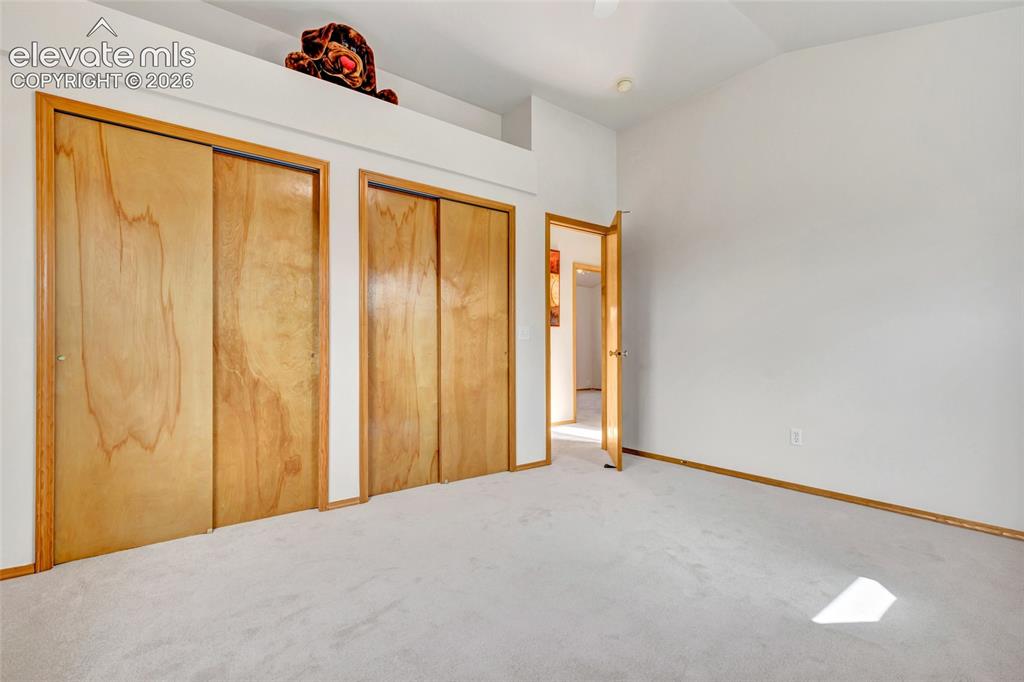 Image 27 of 47: This is another view of the 3rd bedroom. More closets! The closets go all t