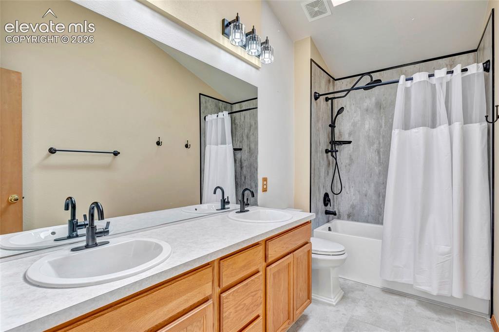 Image 28 of 47: This is the bathroom that the 3 bedrooms on the upper level share. It has b