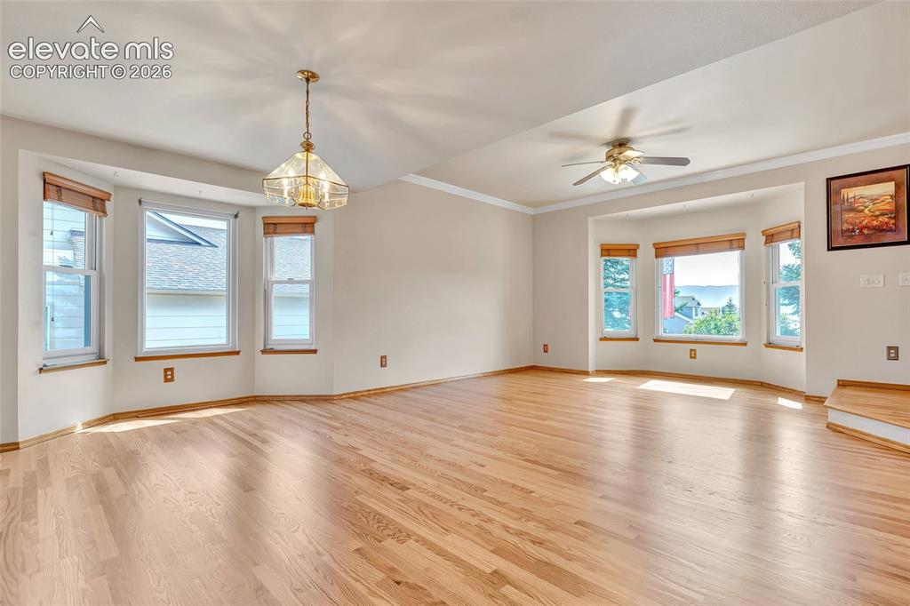 Image 8 of 47: Both bay windows provide so much excellent light. The house feels bright an