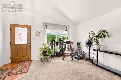 Image 11 of 49: Light and airy entry virtually staged
