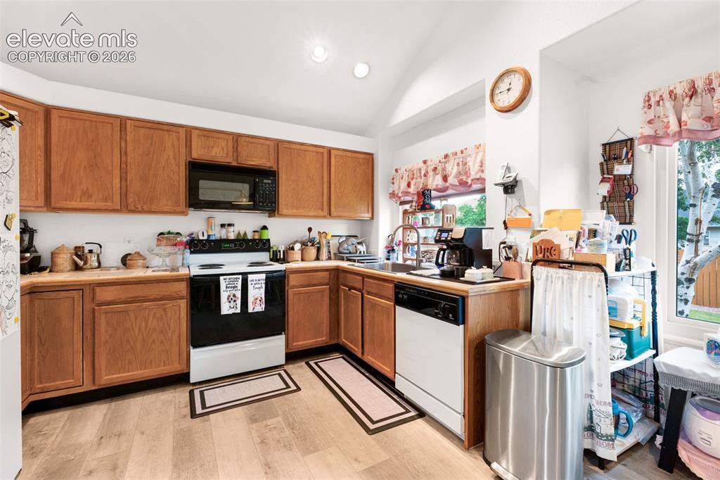 Image 12 of 42: The kitchen offers a lot of cabinet space