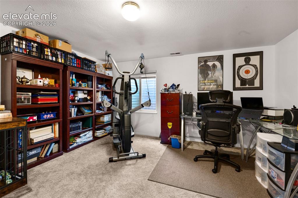 Image 31 of 42: Additional family room/office/game room