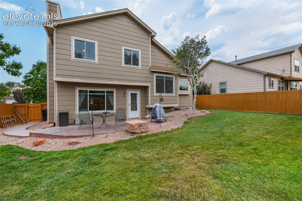 Image 35 of 42: Beautiful newer stamped & colored patio/path