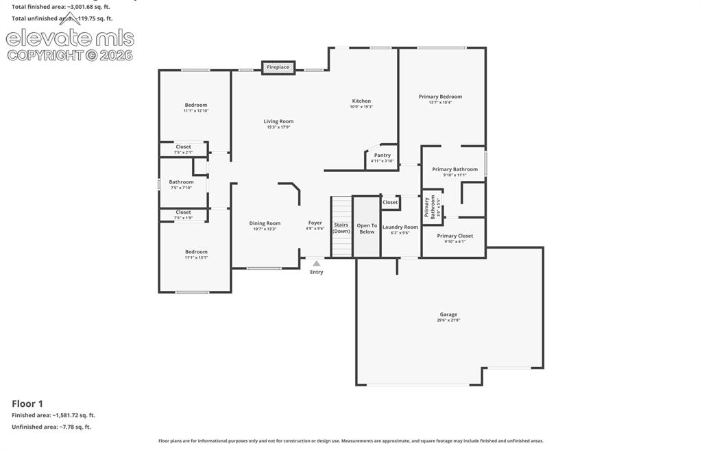 Image 18 of 31: Dedicated laundry space featuring a practical wall shelf, light wall tones,