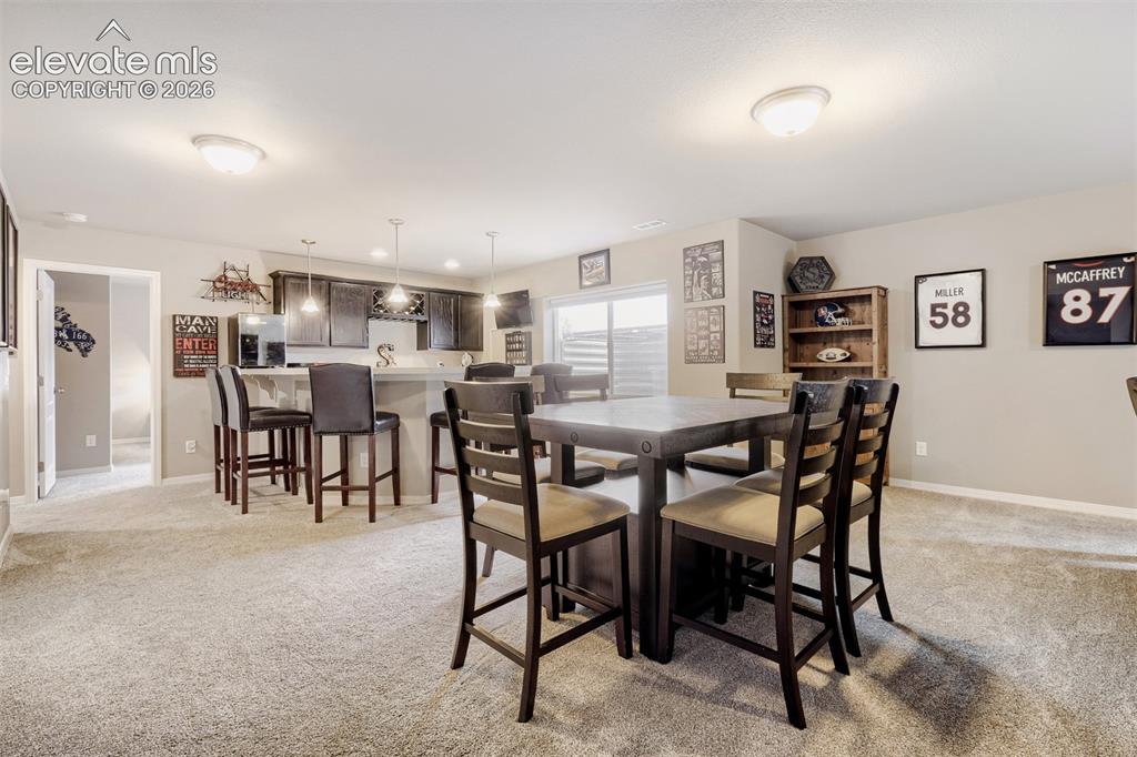 Image 21 of 31: A true sports-and-movie lover’s retreat, with space for lively gatherings a