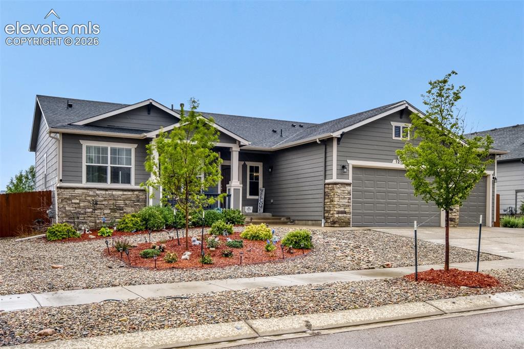Image 29 of 31: Rear exterior featuring maintenance free artificial turf and private fenced